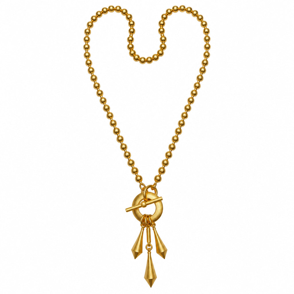 Gold necklace with a pendant on a white background