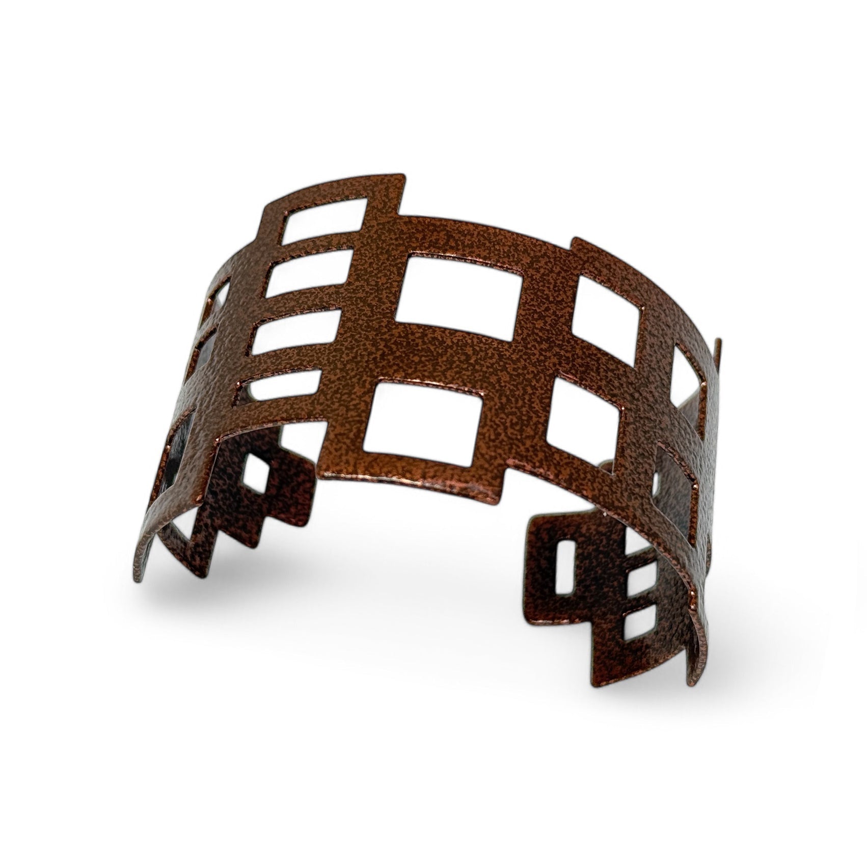 Copper enamel cuff bracelet on a white background