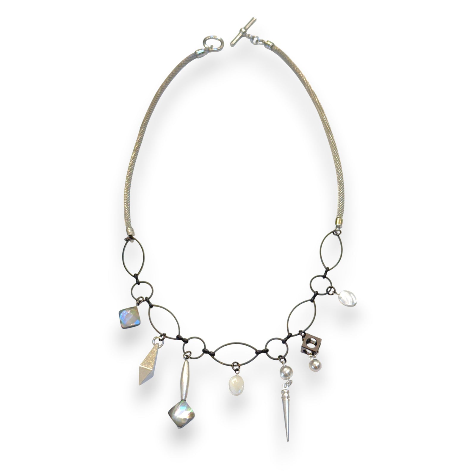 Necklace with various charms on a white background