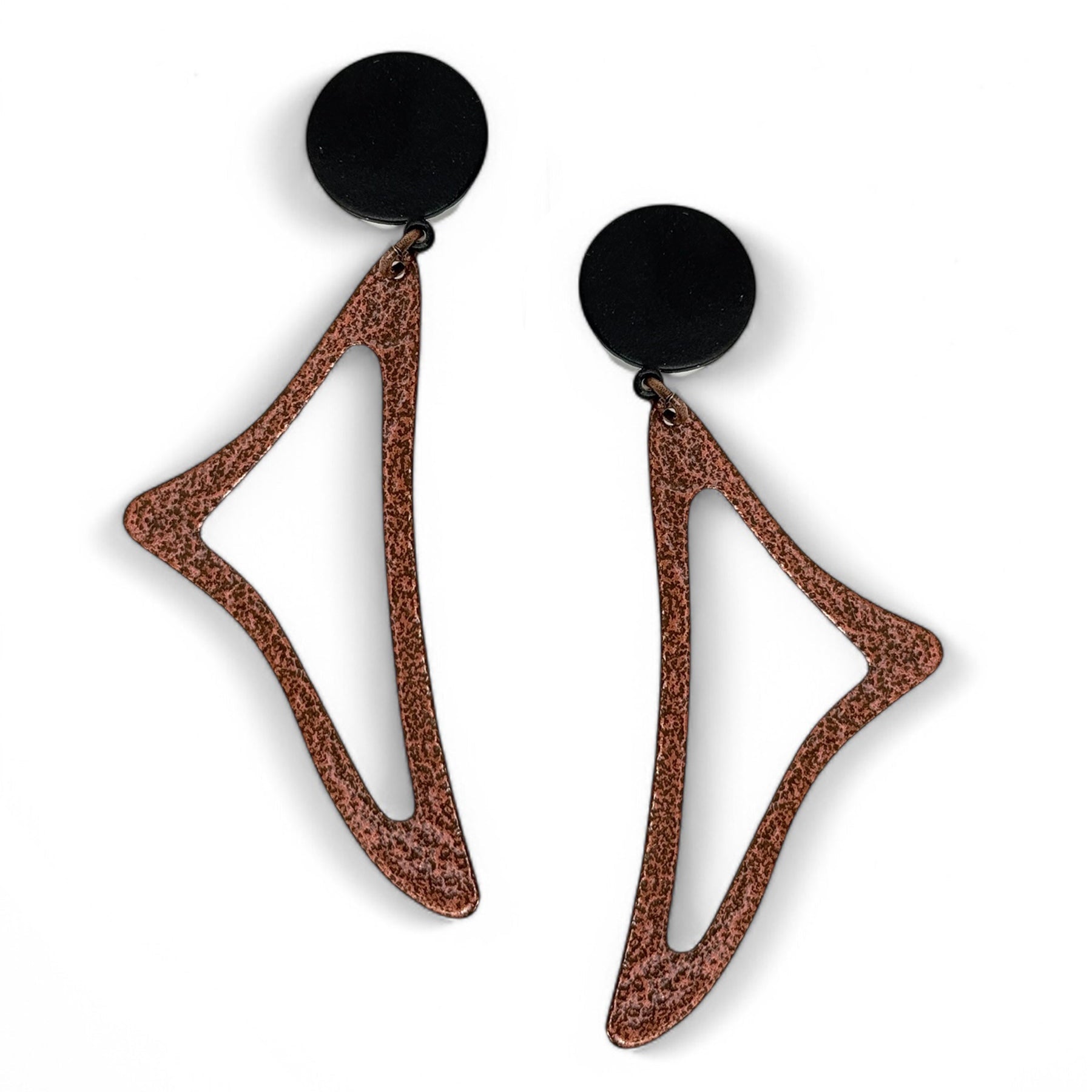 Copper geometric earrings with black circular tops on a white background