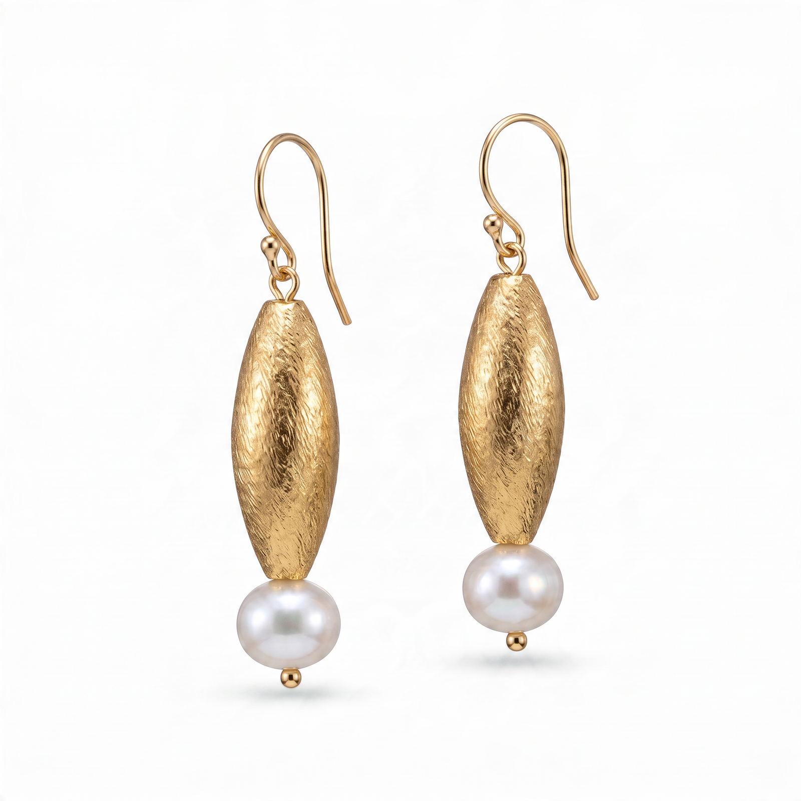 Erica Zap Designs gold vermeil wheat drop earrings featuring textured gold beads and white freshwater pearls.