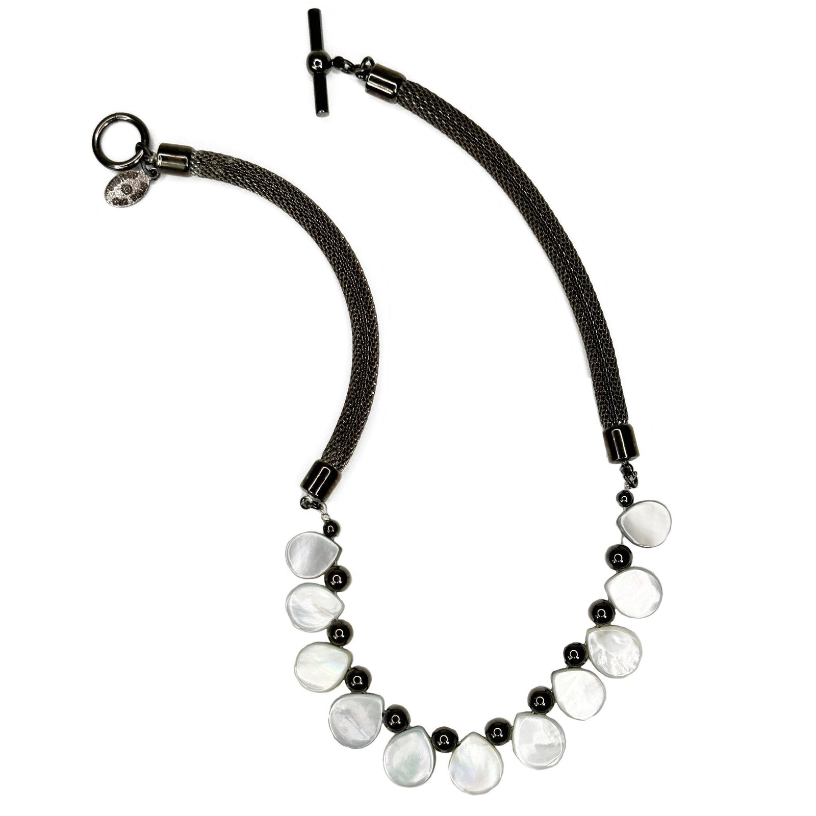 Erica Zap Designs gunmetal mesh necklace featuring reversible white and grey tear-drop mother-of-pearl charms.