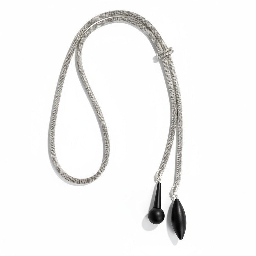 Erica Zap Designs rhodium-plated mesh bolo necklace with matte black geometric drop ends, 36" adjustable.