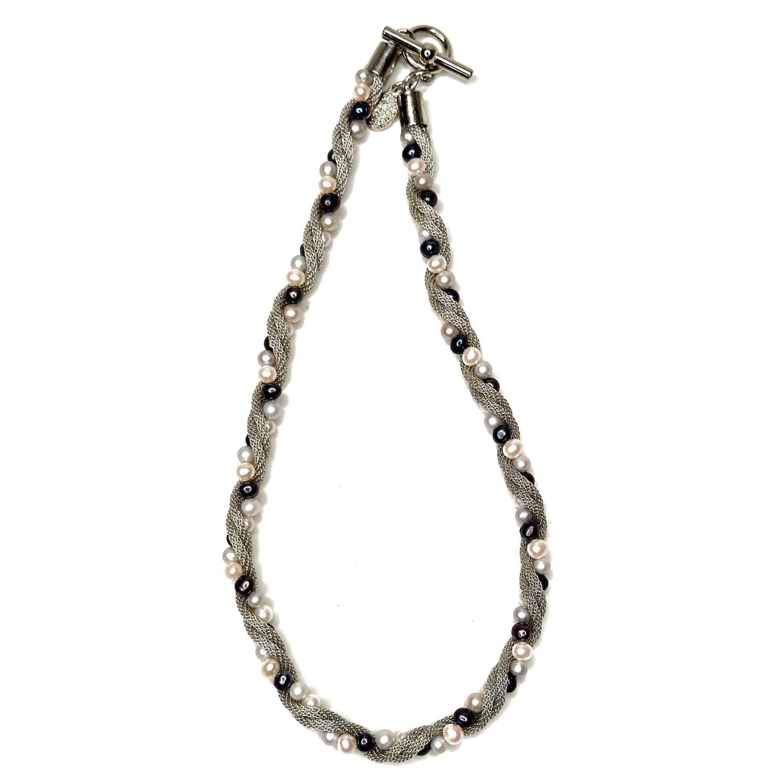 Erica Zap Designs silver mesh necklace with freshwater pearls in white, grey, and black, featuring a toggle clasp.